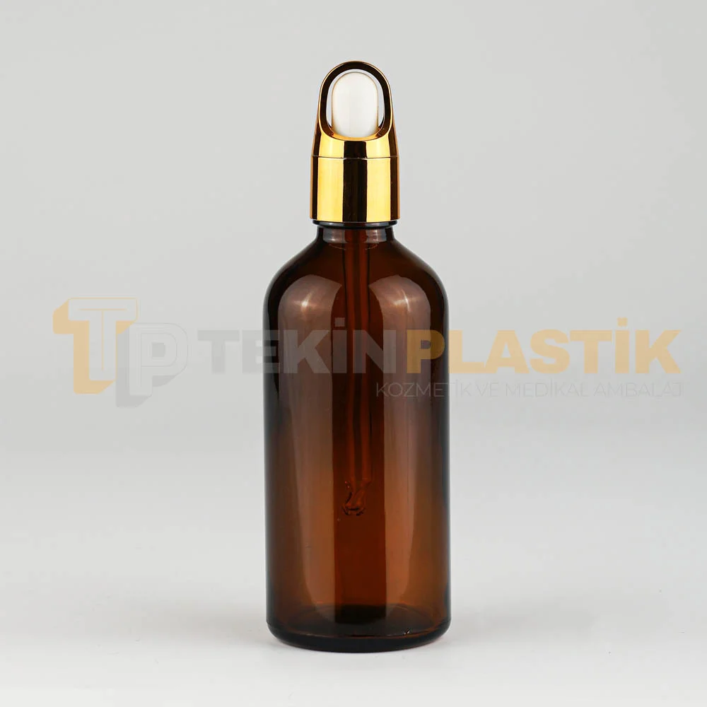 100 ML Toptan Amber Renk Cam Damlalıklı Dropper Şişe Gold Metal Lüx Kapaklı 100 ML Toptan Amber Renk Cam Damlalıklı Dropper Şişe Gold Metal Lüx Kapaklı