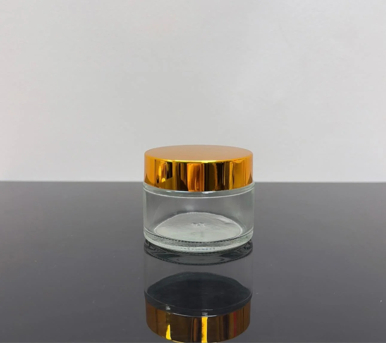 50 ml Şeffaf Cam Krem Kavanozu Parlak Gold Kapaklı Tıpalı 50 ml Şeffaf Cam Krem Kavanozu Parlak Gold Kapaklı Tıpalı