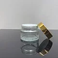 50 ml Şeffaf Cam Krem Kavanozu Parlak Gold Kapaklı Tıpalı 50 ml Şeffaf Cam Krem Kavanozu Parlak Gold Kapaklı Tıpalı