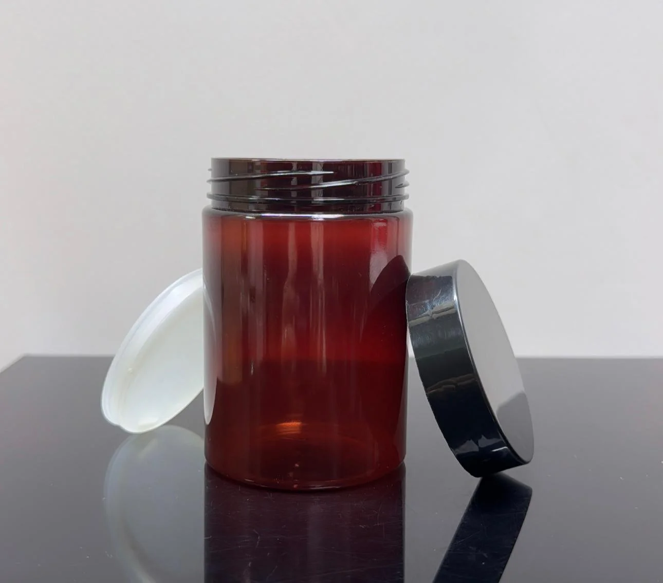 200 ml Amber Pet Krem Kavanozu Siyah Kapaklı Tıpalı 200 ml Amber Pet Krem Kavanozu Siyah Kapaklı Tıpalı