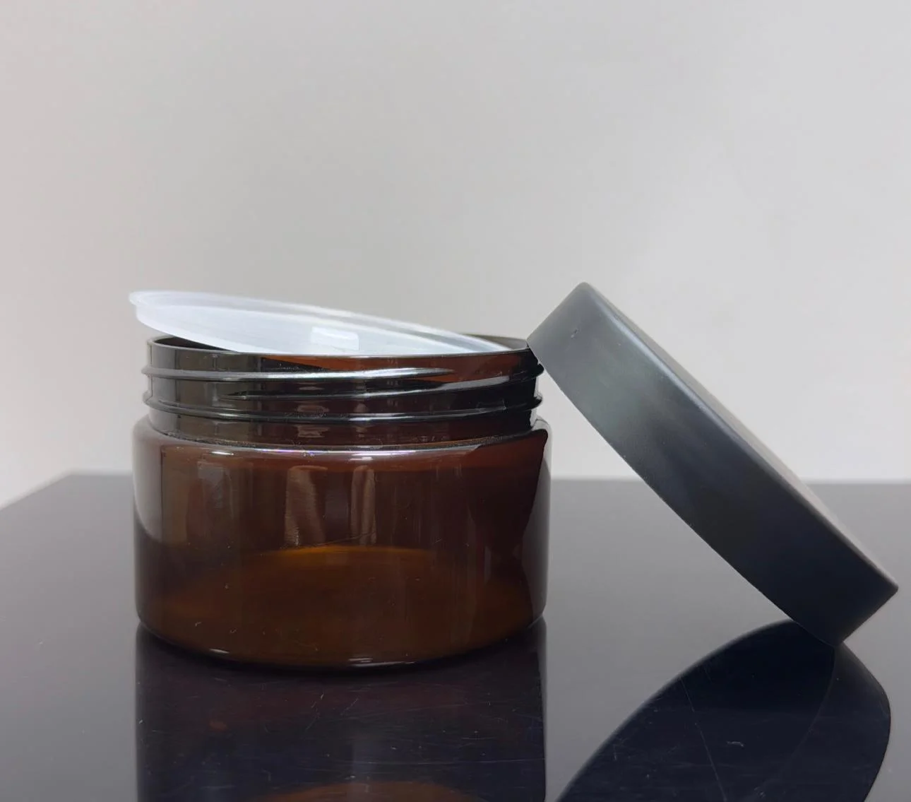 250 ml Amber Pet Krem Kavanozu Mat Siyah Kapaklı Tıpalı 250 ml Amber Pet Krem Kavanozu Mat Siyah Kapaklı Tıpalı