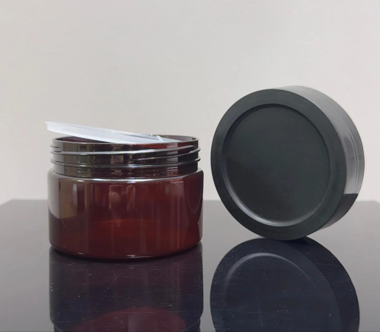250 ml Amber Pet Krem Kavanozu Yüksek Model Siyah Kapaklı Tıpalı 250 ml Amber Pet Krem Kavanozu Yüksek Model Siyah Kapaklı Tıpalı