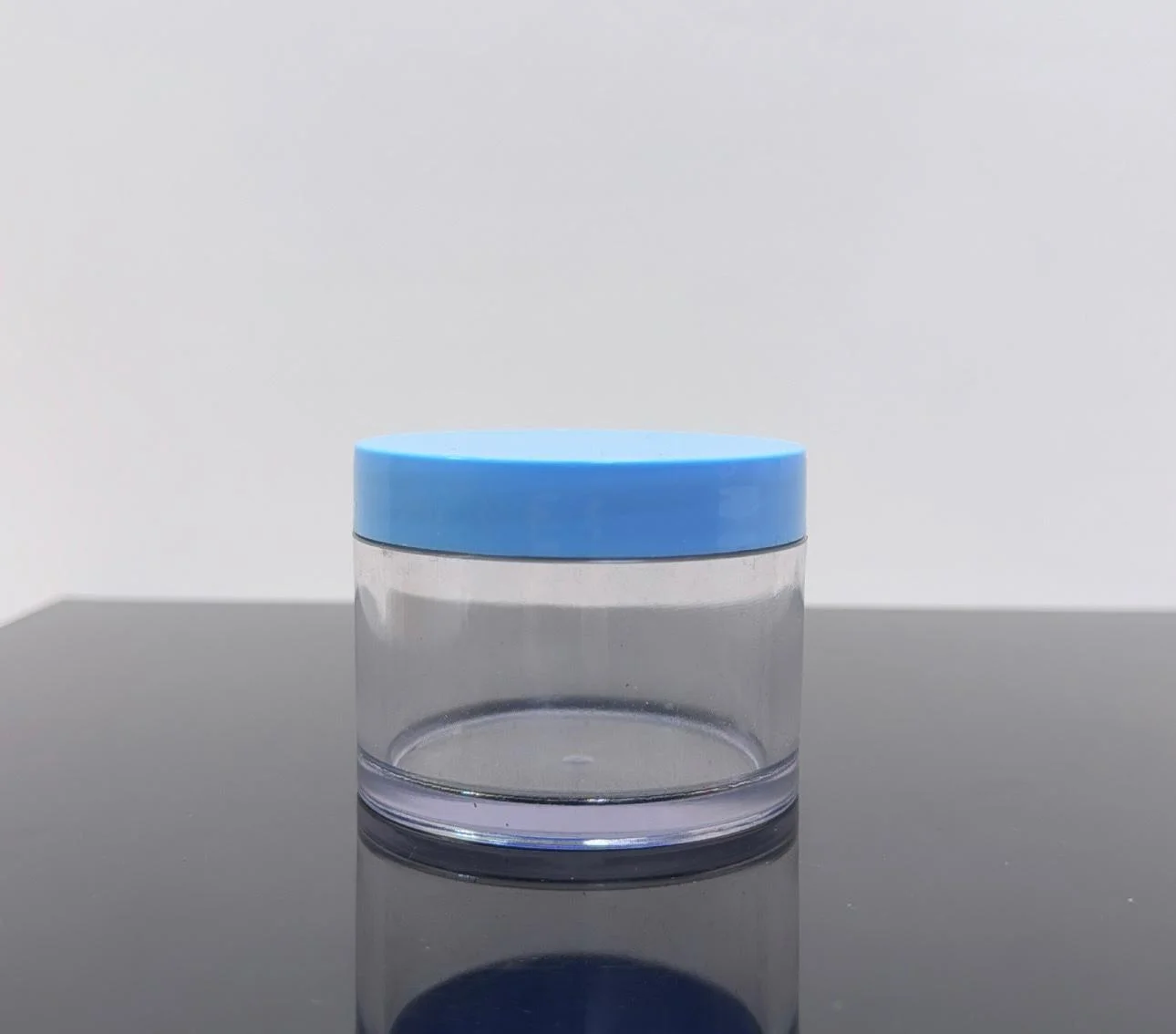 100 ml Şeffaf Mavi Kapaklı Tıpalı Akrilik Kavanoz 100 ml Şeffaf Mavi Kapaklı Tıpalı Akrilik Kavanoz