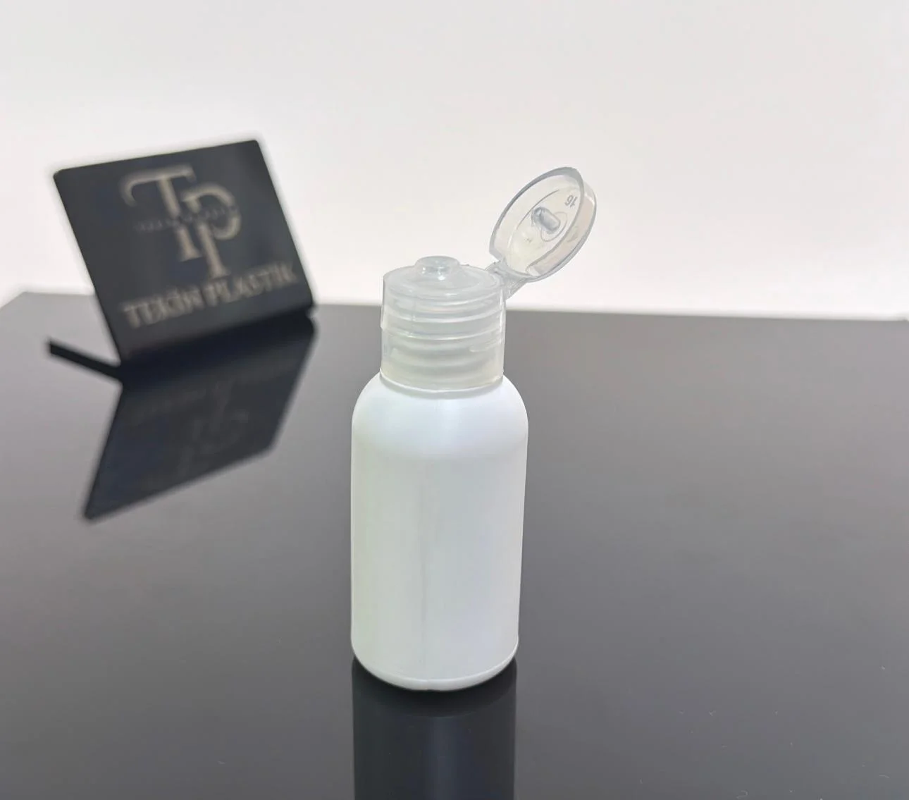 18 mm Şeffaf Fliptop Açmalı Şampuan Kapak 18 mm Şeffaf Fliptop Açmalı Şampuan Kapak