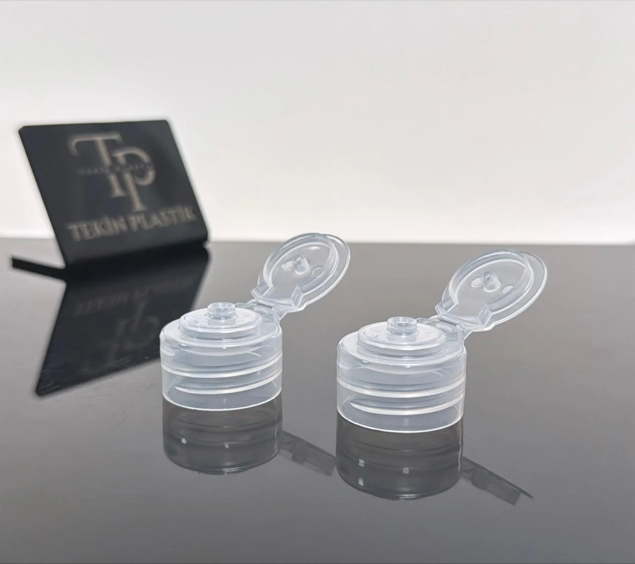 28 mm Şeffaf Fliptop Açmalı Şampuan Kapak 28 mm Şeffaf Fliptop Açmalı Şampuan Kapak