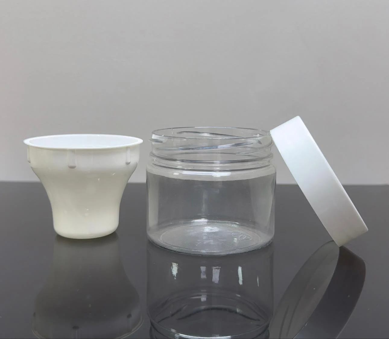 50 ml Çıdarlı Şeffaf Pet Krem Kavanozu Beyaz Kapaklı 50 ml Çıdarlı Şeffaf Pet Krem Kavanozu Beyaz Kapaklı